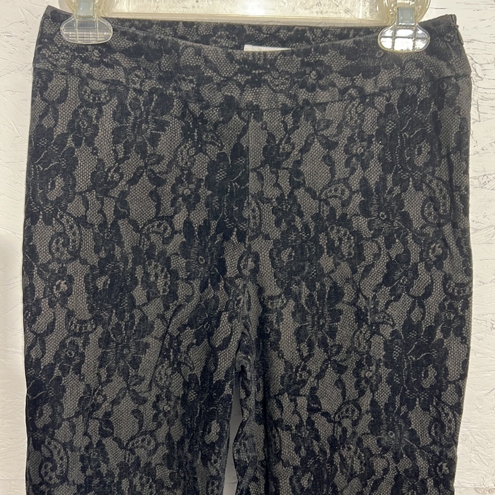 HAROLD’S vintage black velvet and lace straight legged pants.